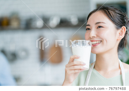 Milk and housewife Milk and housewife 76797488