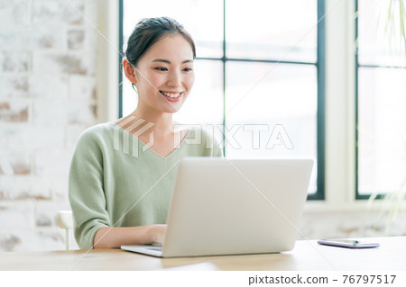 Female in her 20s in telework 76797517