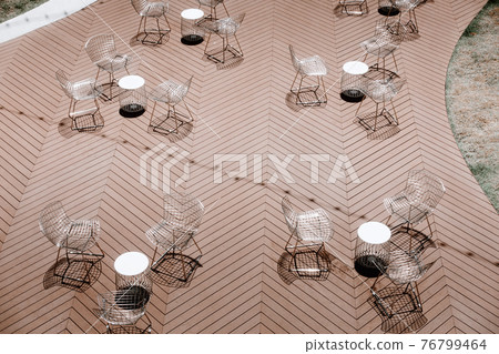 Cafe and Restaurant Empty Outdoors Seating Chair During Lockdown Covid-19 Situation. Business Food Shop and Services Affected From Coronavirus Pandemic. Cafe and Restaurant Empty Outdoors Seating Chair During Lockdown Covid-19 Situation. Business Food Shop and Services Affected From Coronavirus Pandemic. 76799464
