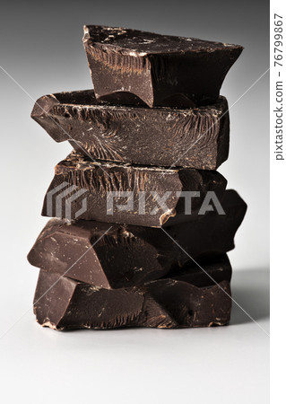 Stacked chocolate white background Stacked chocolate white background 76799867