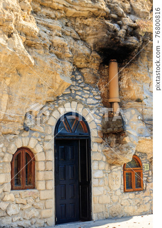 Galician Cave St. Nicholas Monastery located on a bank of the Dniester river in Halytsya village, Chernivtsi region, Ukraine Galician Cave St. Nicholas Monastery located on a bank of the Dniester river in Halytsya village, Chernivtsi region, Ukraine 76800816