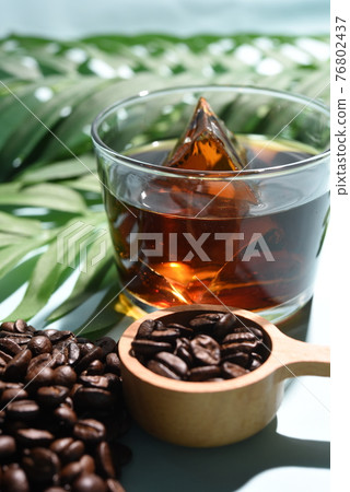 Botanical iced coffee and coffee beans Botanical iced coffee and coffee beans 76802437