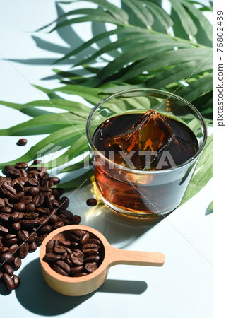 Botanical iced coffee and coffee beans Botanical iced coffee and coffee beans 76802439