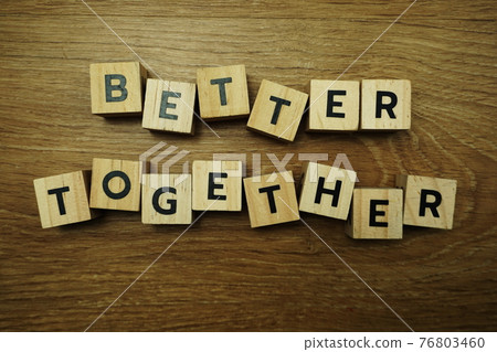 Better Together alphabet letter on wooden background Better Together alphabet letter on wooden background 76803460