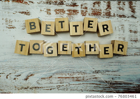 Better Together alphabet letter on wooden background Better Together alphabet letter on wooden background 76803461