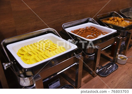 Business hotel breakfast buffet 76803703