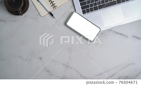Mock up smart phone with empty screen and laptop computer on marble background. 76804671