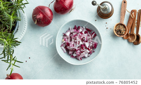 bowl of chopped red onions bowl of chopped red onions 76805452