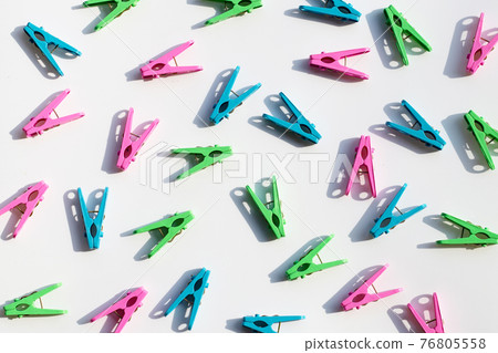 Plastic clothespin on white background. 76805558