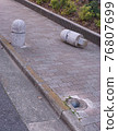 With holes when using and removing the removable bollard on the sidewalk 76807699