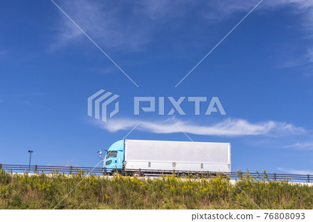 Driving car and blue sky 76808093