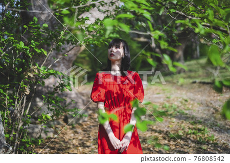 A woman in nature A woman in nature 76808542