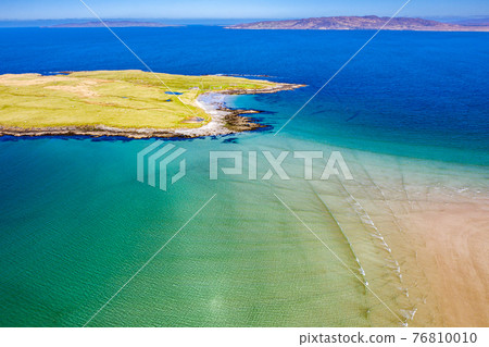 Aerial view of Dunmore Head by Portnoo in County Donegal, Ireland. Aerial view of Dunmore Head by Portnoo in County Donegal, Ireland. 76810010