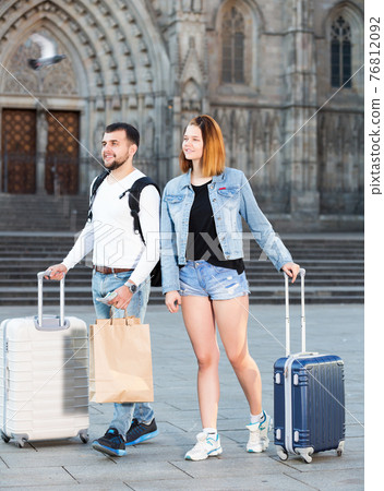 Couple going the historic city center Couple going the historic city center 76812092