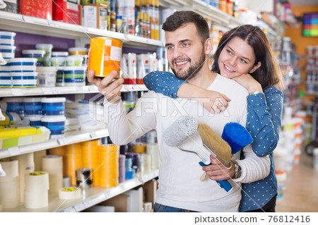 Couple deciding on best color scheme 76812416
