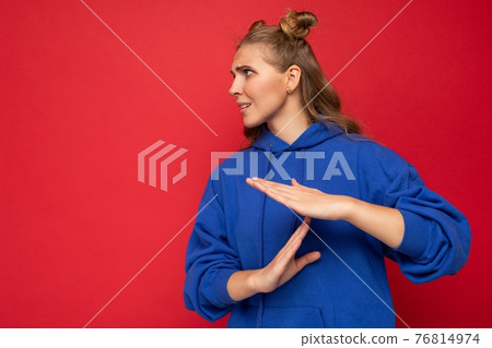 Photo of emotional young pretty blonde female person with two horns with sincere emotions wearing Photo of emotional young pretty blonde female person with two horns with sincere emotions wearing 76814974