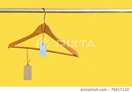 Empty hanger with price tags in the store after sale Empty hanger with price tags in the store after sale 76815128