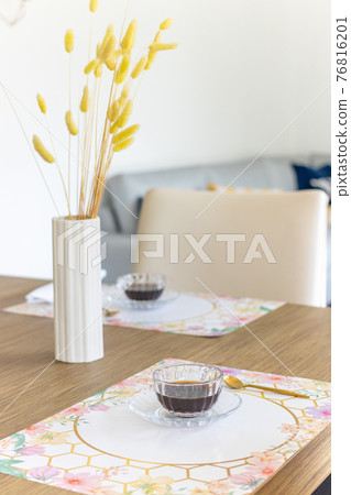 Coffee time. Table decorated with button plant 76816201