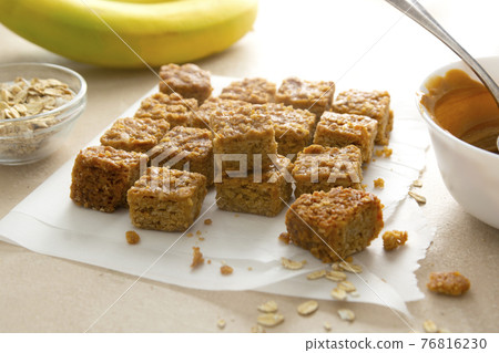 Energy bites, fudges oatmeal healthy snack with bananas, coconut oi, nuts and seeds. Energy bites, fudges oatmeal healthy snack with bananas, coconut oi, nuts and seeds. 76816230