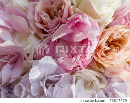Gorgeous bouquet of roses and carnations with decorative dried flowers. 76817779