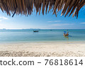Beautiful tropical beach with white sand and palapa (thatched roof) 76818614