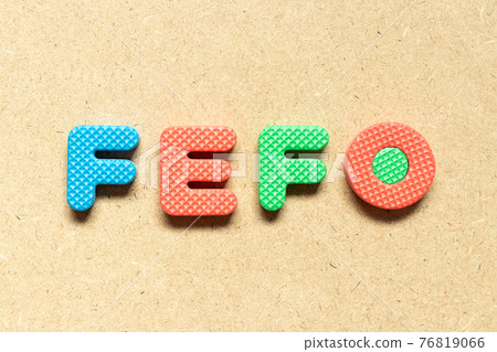 Foam alphabet letter in word FEFO (Abbreviation of first expired first out) on wood background Foam alphabet letter in word FEFO (Abbreviation of first expired first out) on wood background 76819066
