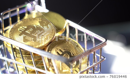 Bitcoins in the Cart. Concept: Purchase of Cryptocurrency 76819446