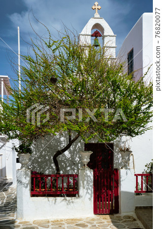 Greek Mykonos street on Mykonos island, Greece 76820077