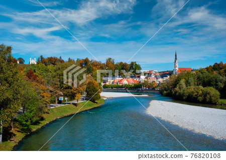 Bad Tolz - picturesque resort town in Bavaria, Germany in autumn and Isar river Bad Tolz - picturesque resort town in Bavaria, Germany in autumn and Isar river 76820108