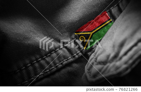 Tag on dark clothing in the form of the flag of the Vanuatu Tag on dark clothing in the form of the flag of the Vanuatu 76821266