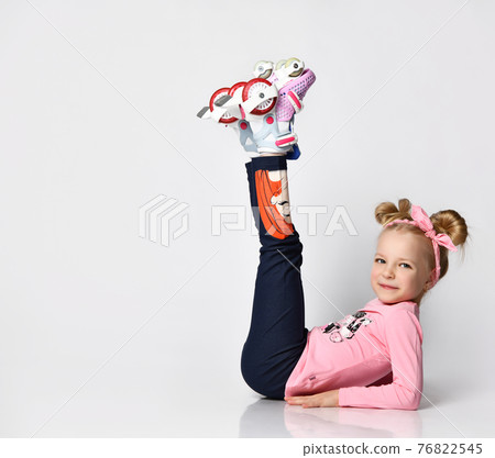 Full body portrait funky girl wearing on roller Full body portrait funky girl wearing on roller 76822545