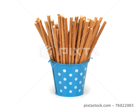 Sweet straws. Dry baked goods in the form of thin sticks Sweet straws. Dry baked goods in the form of thin sticks 76822865
