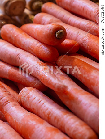 carrot orange background vegetable roots closeup autumn design 76822969