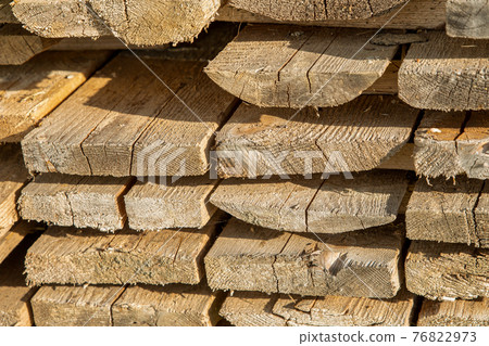 background of boards light brown, building material for the house close-up background of boards light brown, building material for the house close-up 76822973