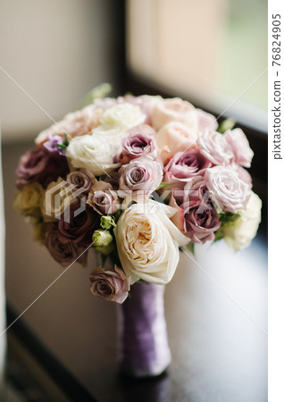 beautiful stylish wedding bouquet with roses .Wedding Decor 76824905