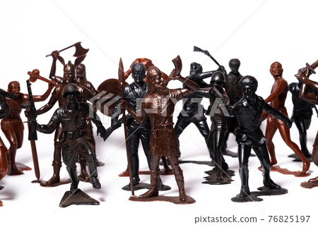 A set of different toy figures of soldiers on a white background A set of different toy figures of soldiers on a white background 76825197