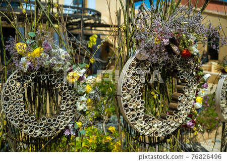 Original wedding decor at the wedding ceremony on the street near the villa in Provence.France Original wedding decor at the wedding ceremony on the street near the villa in Provence.France 76826496