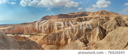 Panorama of the gorge of the dried riverbed of the OG river near the Dead Sea 76826845