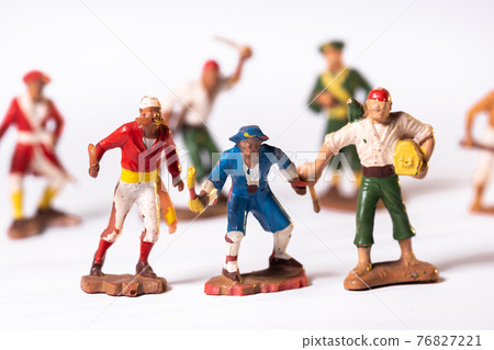 Vintage pirate toys isolated on white background 76827221