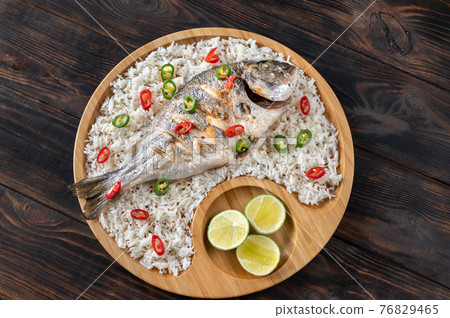 Grilled fish with rice Grilled fish with rice 76829465
