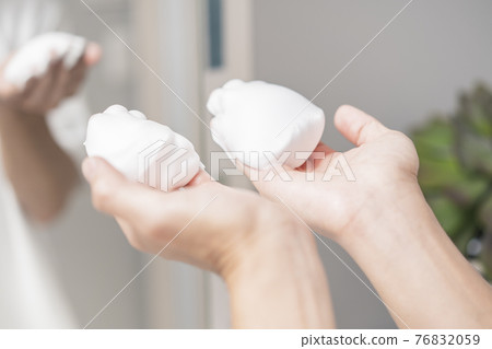 man washing face 76832059
