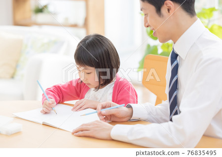 Educational image: Girls and male teachers studying at a cram school Educational image: Girls and male teachers studying at a cram school 76835495