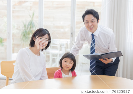 Education Parents and children and teachers undergoing tripartite interviews 76835927