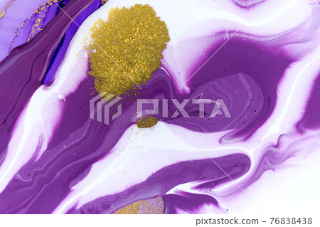 Cose up gold glitter on mixed inks background. 76838438