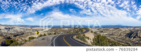 Panoramic View of a scenic route on top of a mountain ridge Panoramic View of a scenic route on top of a mountain ridge 76839284