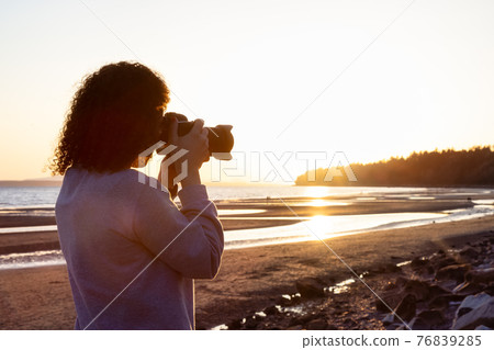 Adventure Travel Photographer at West Pacific Ocean Coast. 76839285