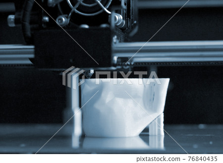 Objects printed by 3d printer. Automatic three dimensional 3d printer performs Objects printed by 3d printer. Automatic three dimensional 3d printer performs 76840435