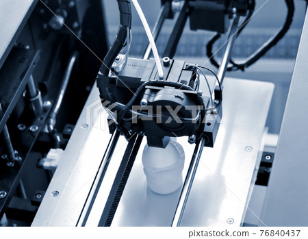 Objects printed by 3d printer. Automatic three dimensional 3d printer performs Objects printed by 3d printer. Automatic three dimensional 3d printer performs 76840437