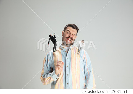 Human issues - angel and demon characters on adult man. Dark and light side of everyone. 76841511