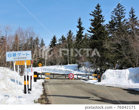 White silver gate closed in winter (Kamifurano-cho, Hokkaido) 76842171